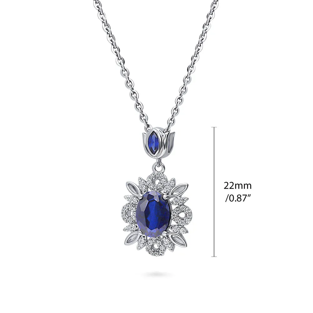 Flower Halo Simulated Blue Sapphire CZ Set in Sterling Silver